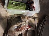 a plastic container with a bunch of items in it