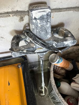 an image of a bathroom with a toilet and a sink