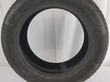 a close up of a tire on a white surface