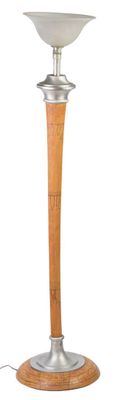 a lamp that is sitting on a wooden stand