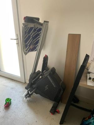 a chair that is next to a door in a room