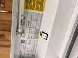 a picture of a door with a warning sign on it