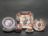 an image of a group of plates and cups on a table