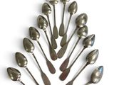a lot of spoons and spoon spoons arranged in the shape of a christmas tree