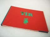 a red book with a green logo on it