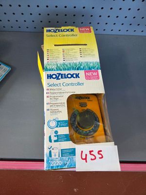 a box of electronic devices on a shelf in a store