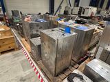 a man that is standing in front of some metal boxes