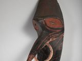 an image of a wooden mask on a white background