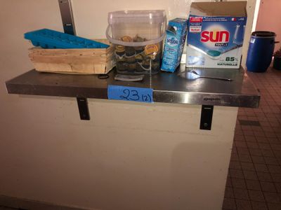 a box of sun detere and a box of soap on a counter