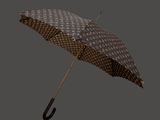 un parapluie marron et blanc avec un manche noir