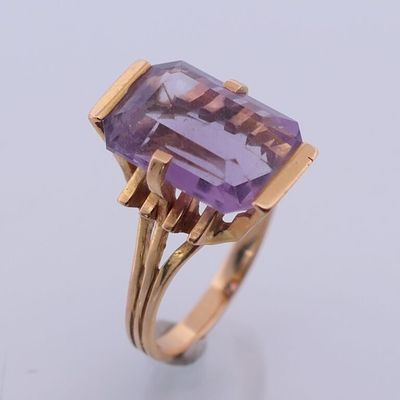 Bague en or jaune 750 sertie d'une améthyste. - Photo 1