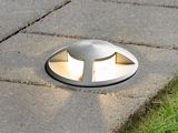 a light that is sitting on the ground in the ground