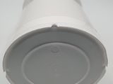 a close up of a white object on a white surface