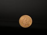 an image of a gold coin on a black background
