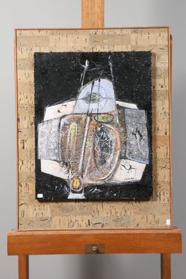 painting on a easel with a painting of a boat on it