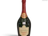 a close up of a bottle of champagne on a white background