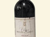 a bottle of wine that is sitting on a table