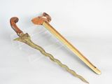 pair of wooden and brass - plated walking canes with wooden handles