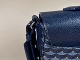 navy blue leather bag with gold details and a strap