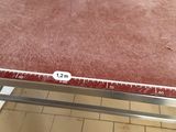 a brown table with a number on it in a kitchen