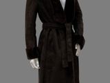 a mannequin dressed in a brown robe and white shirt