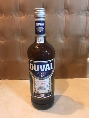 a bottle of alcohol that is sitting on a table