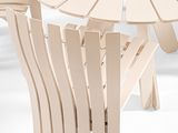 an image of a table and chairs with an umbrella on it