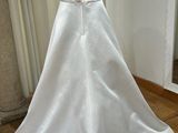 the back of a wedding dress on a mannequin mannequin mannequin mannequin mannequin mannequin mannequin mannequin