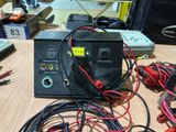 a table with a lot of wires and wires on it