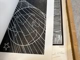 a picture of an open book with a drawing on it
