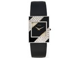 une montre en noir et blanc avec des diamants sur le cadran