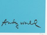 an image of a blue card with a handwritten signature on it