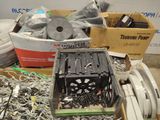 a pile of assorted electronics and wires in a box