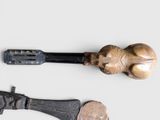 two wooden objects that are sitting on a table