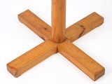 a close up of a wooden cross on a white background