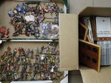a box full of toy soldiers and a box full of other toys