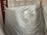 a mattress that is wrapped up in a box