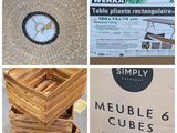 several different pictures of a table and chairs in a store