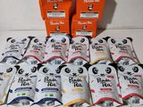 several packages of panda tea sit on a table next to each other