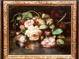 painting of a still life of roses and other flowers in a gold frame