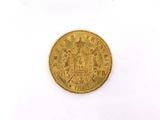 a gold coin with a crown on top of it