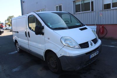 a white van that is parked in a parking lot