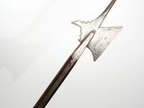 a very long metal sword with a pointed blade