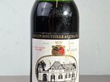 a bottle of wine that is sitting on a table