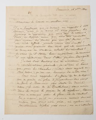 a handwritten letter written in black ink on a piece of paper