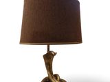 an image of a table lamp with a brown shade on it