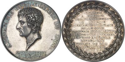 a close up of a coin with a picture of a man on it