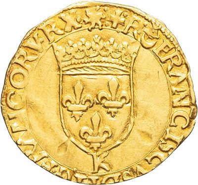 a gold coin with a crown on top of it