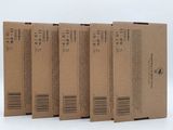 quatre cartons marron portant la mention « vendu par lot de 5 »