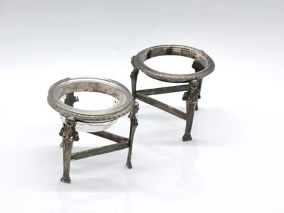 pair of antique silver plated candlesticks on stand